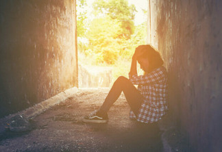 sad woman hug her knee and cry feeling so bad,loneliness,sadness,nobody here.