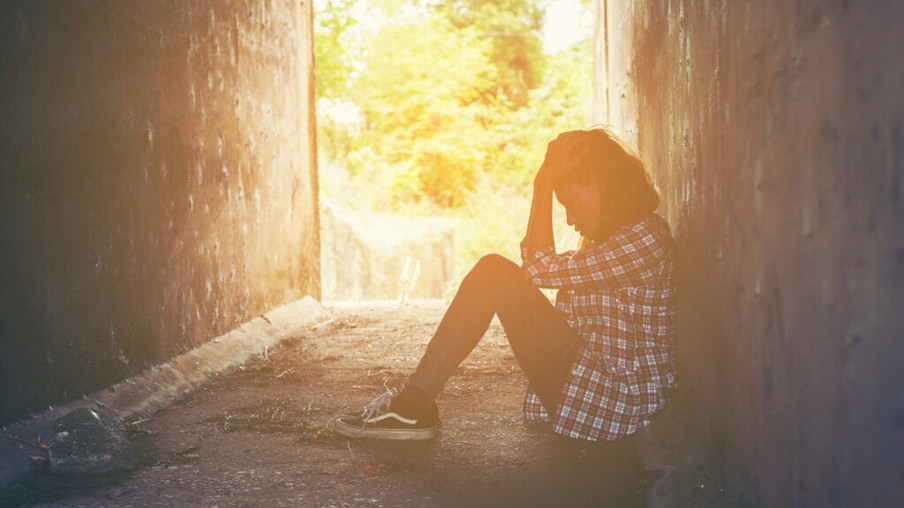 sad woman hug her knee and cry feeling so bad,loneliness,sadness,nobody here.