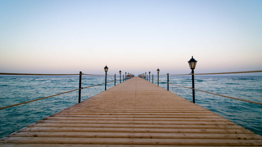 Tranquil wooden pier - quiet evening at Red Sea